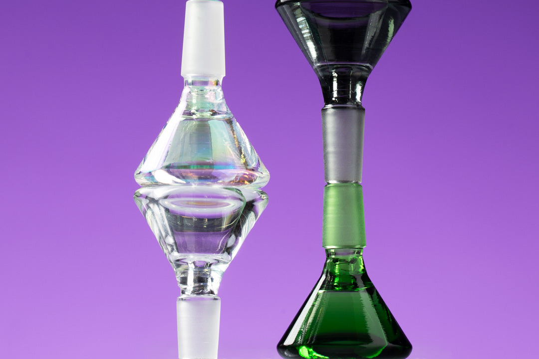 assorted bong bowls close up against purple background 