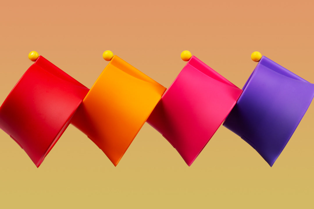 Assorted bubbler silicone covers against an orange background
