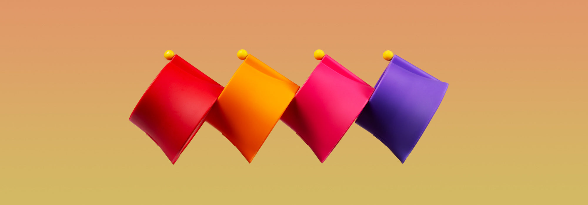 Assorted bubbler silicone covers against an orange background