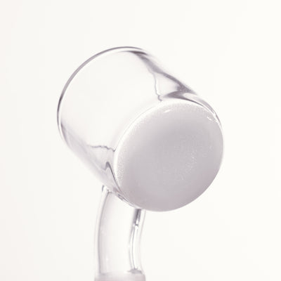 A close up of clean banger, showing the high-quality quartz glass, white background