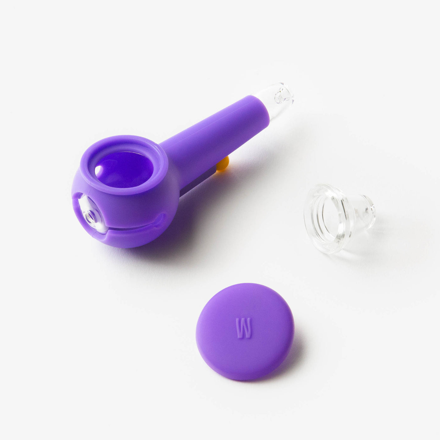 Grape purple silicone pipe with detachable glass bowl on a white background.