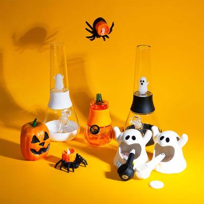 Halloween edition ghost percolator Bong, bubblers, and pipe family collection, yellow backdrop with pumpkin 