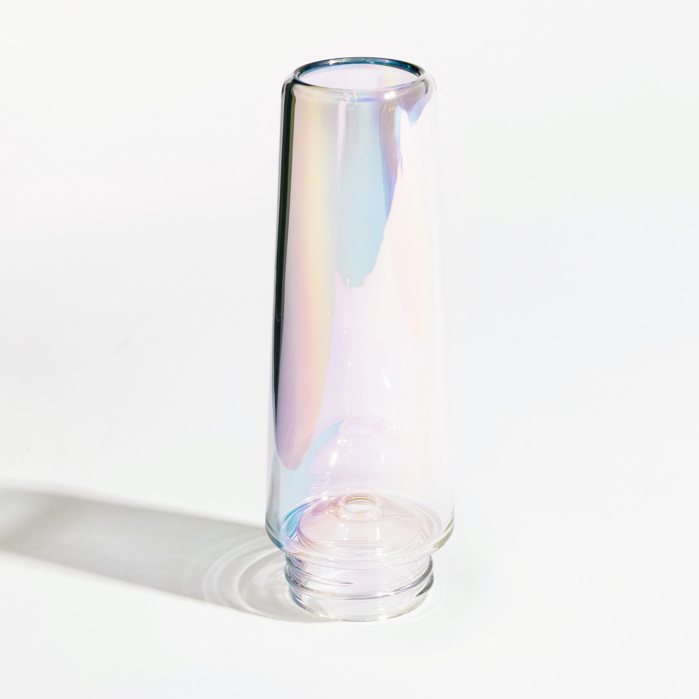 Iridescent ice catcher for bongs, reflecting the light, white background