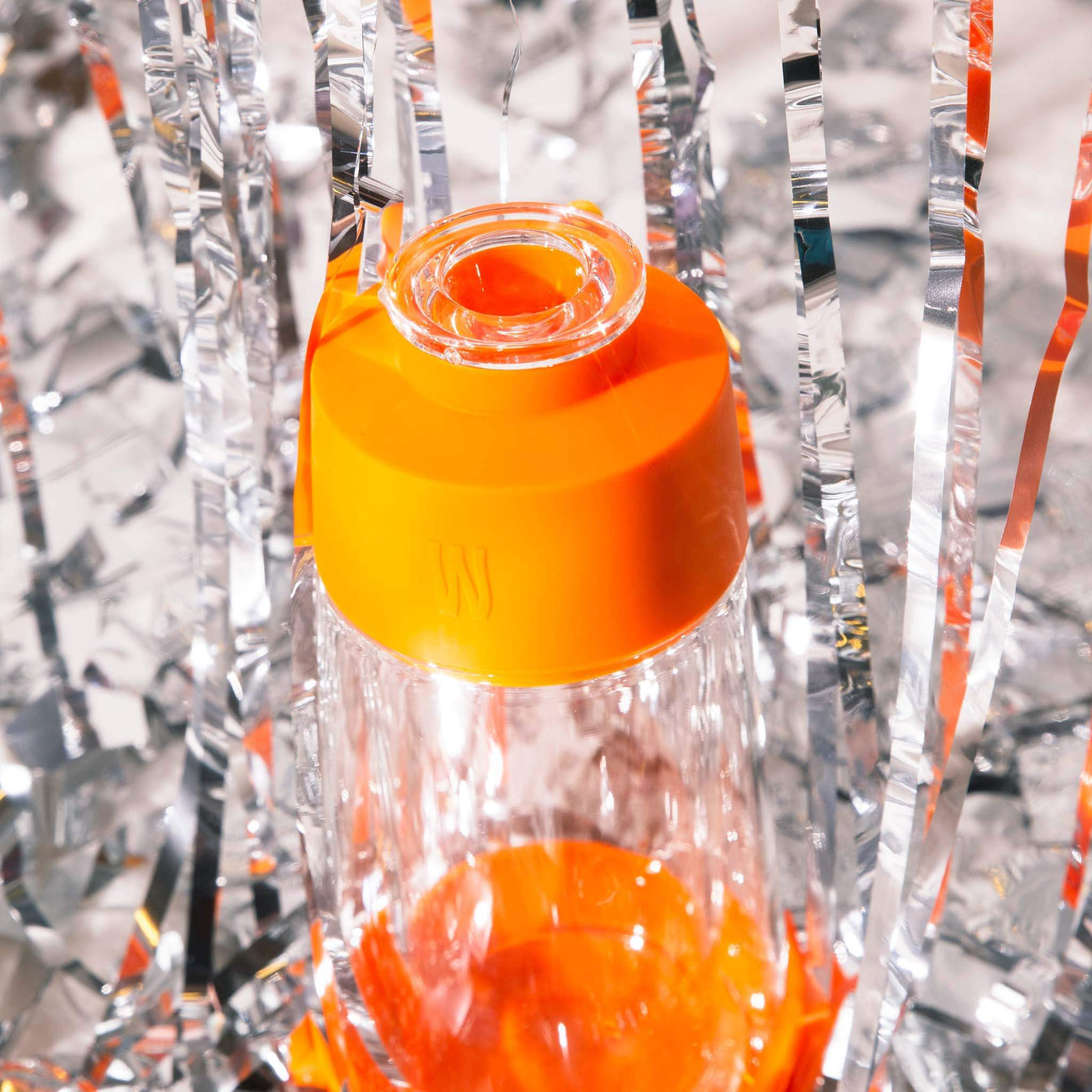 pumpkin orange gravity bong styled with confetti 