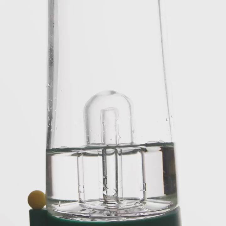 The close up of percolator and water bubbling inside, showing water filtration in white background  