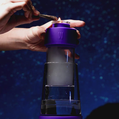 purple gravity bong in use with galaxy background 