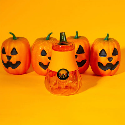 Cute Pumpkin Bubbler with pumpkin props, yellow background 