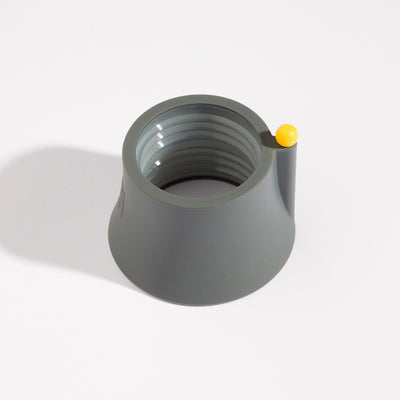 Smoke grey silicone bong connector in a white background