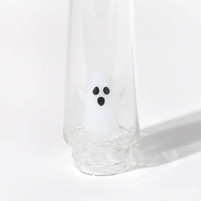 close up of the ghost: Spooky white ghost percolator water bong tube and white backdrop 