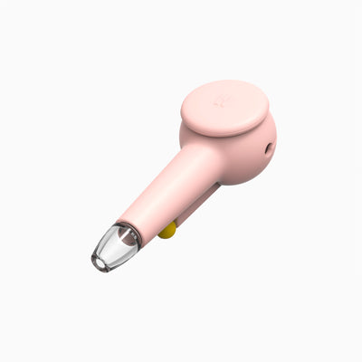 Top view of a designer hand pipe with baby pink silicone covers, cap on for protection and herb storage.