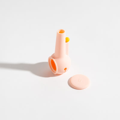 Ultra-soft, dust-resistant baby pink silicone covers for glass pipe protection.