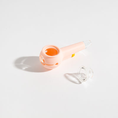 Product photo of an easy-to-clean baby pink glass pipe with separated bowl for an enjoyable smoking experience.