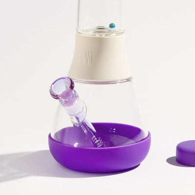 clear bong glass with white and grape silicone, with purple bowl and white background 