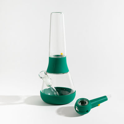 A bundle set of the Weeday modular glass bong and spoon pipe in forest green silicone covers on a white background.