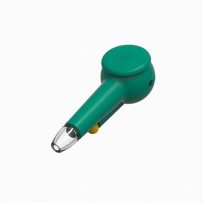 Top view of a designer hand pipe with forest green silicone covers, cap on for protection.