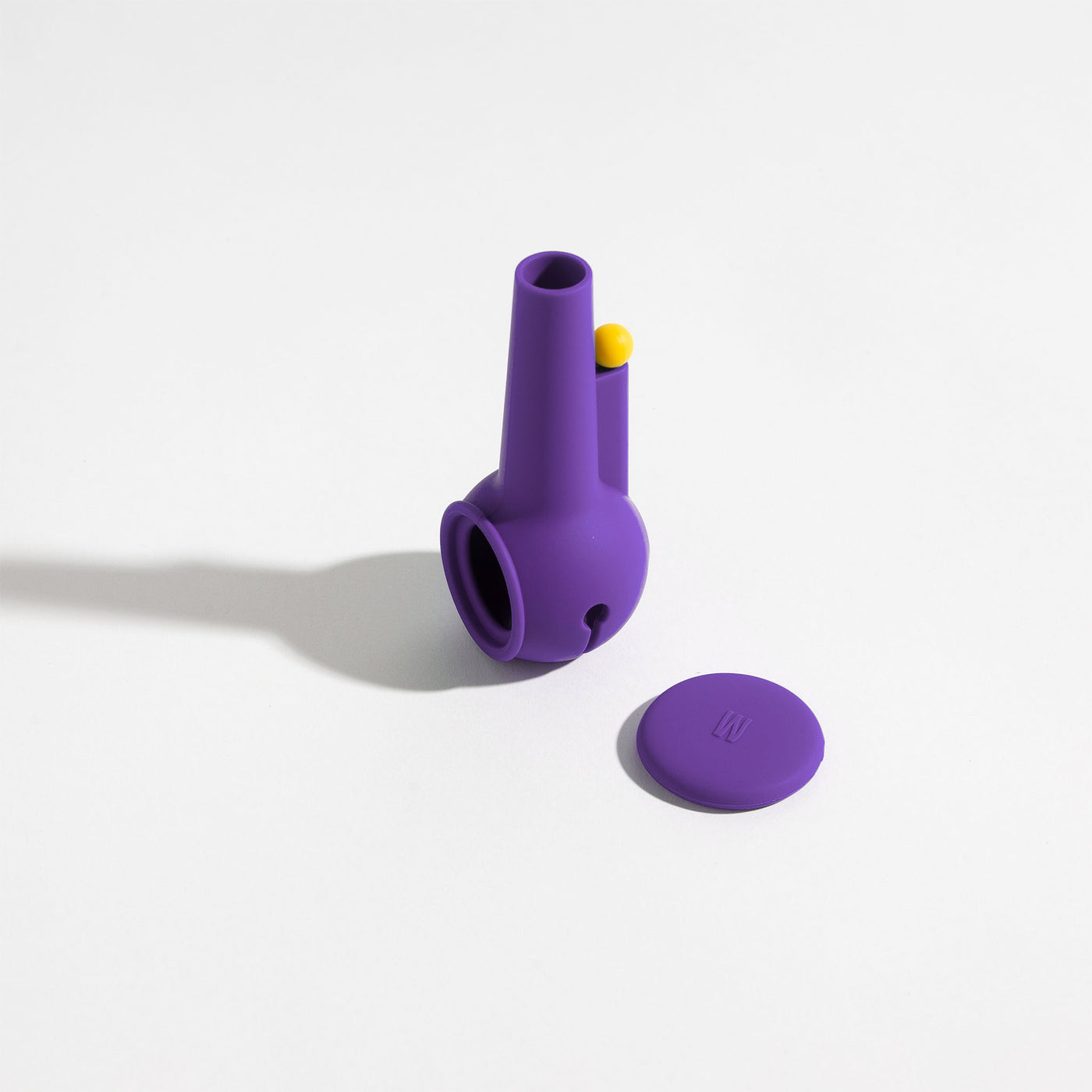 Grape purple silicone pipe cover for glass pipe protection on a white background.