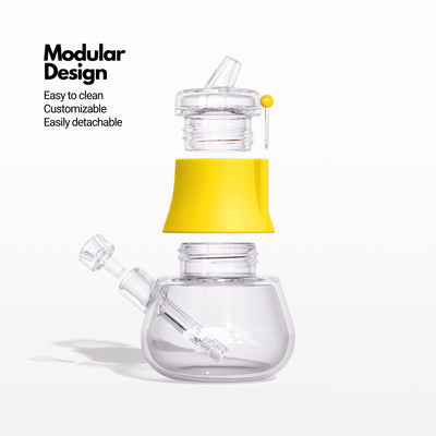 Render of a hot sunshine silicone and glass bubbler, disassembled on a white background.