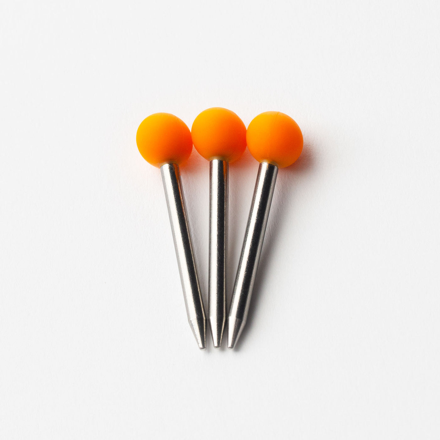 Pumpkin pokers in three, white background