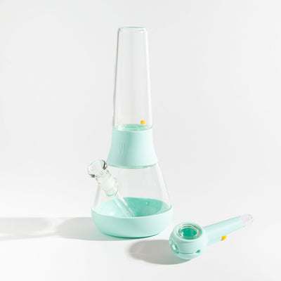 A bundle set of the Weeday modular glass bong and spoon pipe in sky silicone covers on a white background.