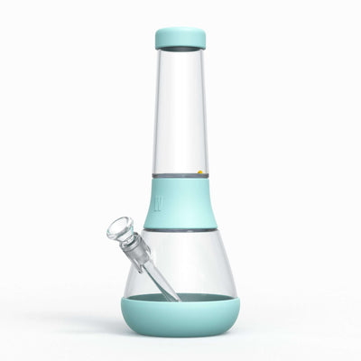 A designer glass bong with protective silicone covers in sky blue.