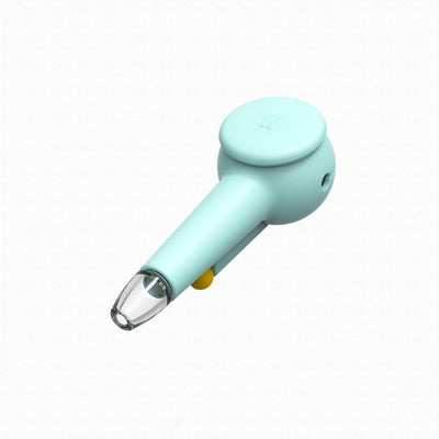 Top view of a designer hand pipe with sky blue silicone covers, cap on for protection.