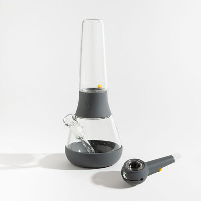 A bundle set of the Weeday modular glass bong and spoon pipe in smoke silicone covers on a white background.