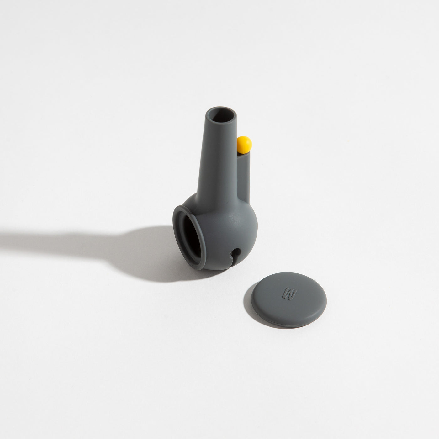 Smoke gray silicone pipe cover for glass pipe protection on a white background