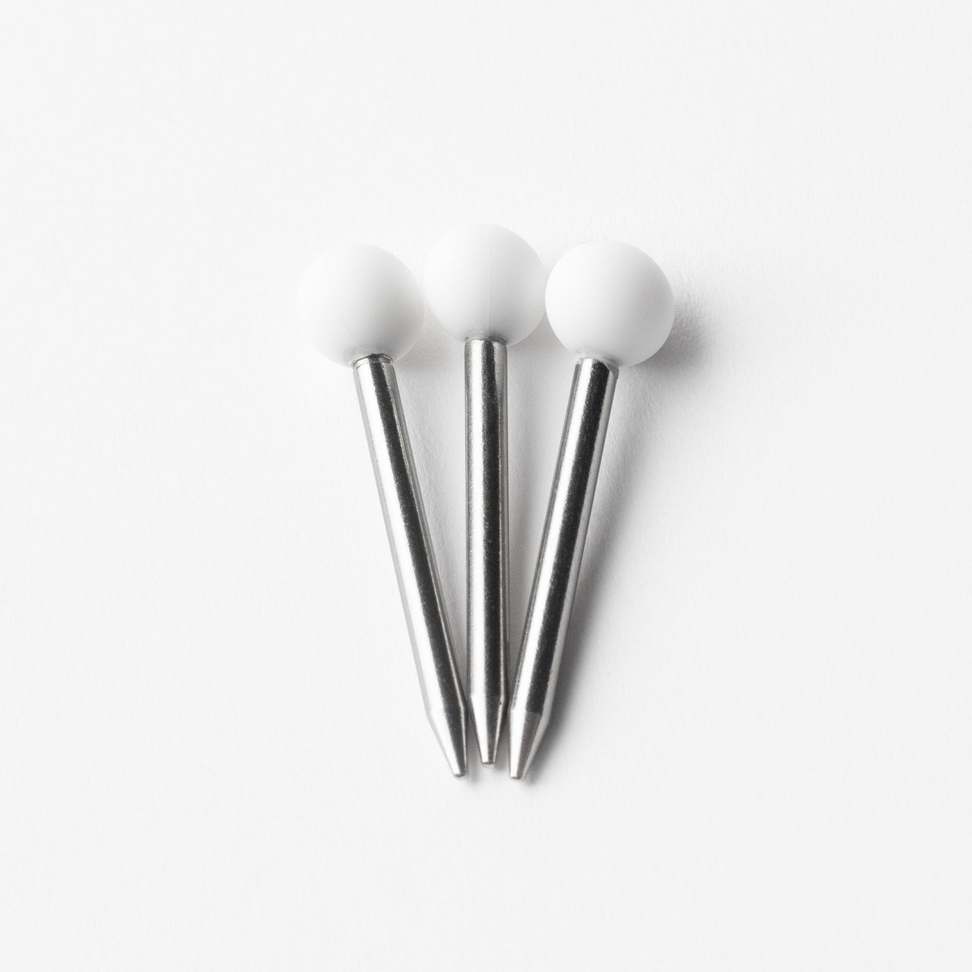 Snow white pokers in three, white background